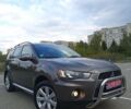 Коричневий Міцубісі Аутлендер, об'ємом двигуна 2.2 л та пробігом 155 тис. км за 11650 $, фото 1 на Automoto.ua