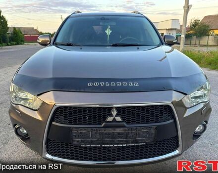 Коричневый Мицубиси Аутлендер, объемом двигателя 2.4 л и пробегом 178 тыс. км за 10550 $, фото 1 на Automoto.ua