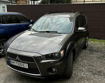 Коричневый Мицубиси Аутлендер, объемом двигателя 2.18 л и пробегом 259 тыс. км за 10900 $, фото 2 на Automoto.ua