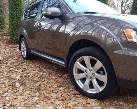 Коричневый Мицубиси Аутлендер, объемом двигателя 2.2 л и пробегом 155 тыс. км за 11350 $, фото 1 на Automoto.ua