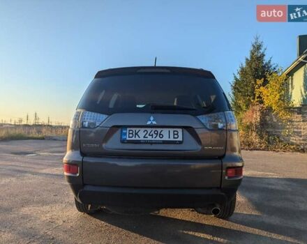 Коричневый Мицубиси Аутлендер, объемом двигателя 2.4 л и пробегом 248 тыс. км за 10000 $, фото 3 на Automoto.ua