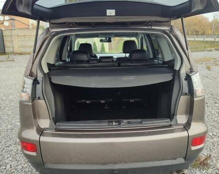 Коричневий Міцубісі Аутлендер, об'ємом двигуна 2.27 л та пробігом 149 тис. км за 12800 $, фото 7 на Automoto.ua