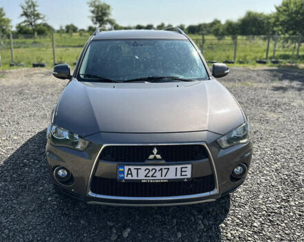 Коричневый Мицубиси Аутлендер, объемом двигателя 2.2 л и пробегом 230 тыс. км за 11700 $, фото 1 на Automoto.ua