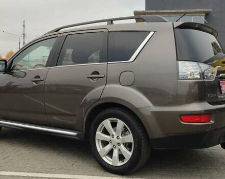 Коричневый Мицубиси Аутлендер, объемом двигателя 2.2 л и пробегом 259 тыс. км за 11600 $, фото 2 на Automoto.ua