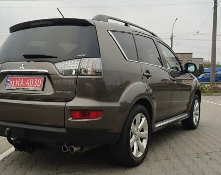 Коричневый Мицубиси Аутлендер, объемом двигателя 2.2 л и пробегом 259 тыс. км за 11600 $, фото 4 на Automoto.ua