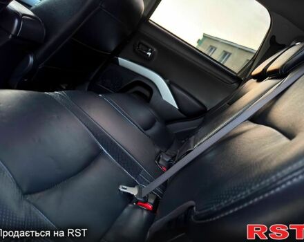 Коричневый Мицубиси Аутлендер, объемом двигателя 2.4 л и пробегом 178 тыс. км за 10550 $, фото 5 на Automoto.ua