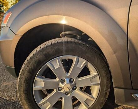 Коричневый Мицубиси Аутлендер, объемом двигателя 2.4 л и пробегом 248 тыс. км за 10000 $, фото 4 на Automoto.ua