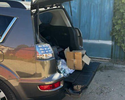 Коричневый Мицубиси Аутлендер, объемом двигателя 2.18 л и пробегом 259 тыс. км за 10900 $, фото 11 на Automoto.ua