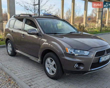 Коричневый Мицубиси Аутлендер, объемом двигателя 2.27 л и пробегом 242 тыс. км за 10900 $, фото 2 на Automoto.ua