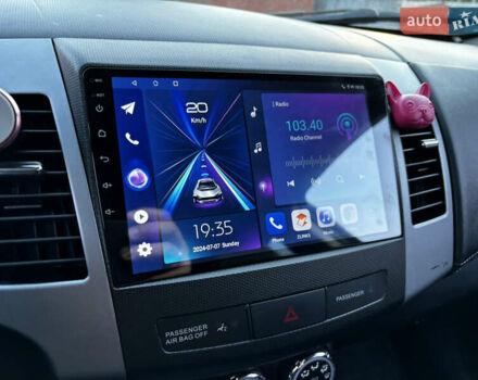 Коричневый Мицубиси Аутлендер, объемом двигателя 2.18 л и пробегом 259 тыс. км за 10900 $, фото 7 на Automoto.ua