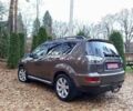 Коричневый Мицубиси Аутлендер, объемом двигателя 2.2 л и пробегом 155 тыс. км за 11350 $, фото 24 на Automoto.ua