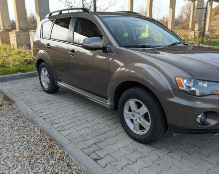 Коричневый Мицубиси Аутлендер, объемом двигателя 2.27 л и пробегом 242 тыс. км за 10900 $, фото 4 на Automoto.ua