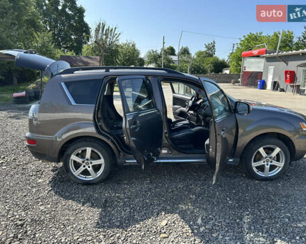 Коричневый Мицубиси Аутлендер, объемом двигателя 2.2 л и пробегом 230 тыс. км за 11700 $, фото 2 на Automoto.ua