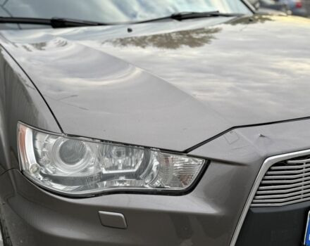 Коричневый Мицубиси Аутлендер, объемом двигателя 2.4 л и пробегом 191 тыс. км за 10900 $, фото 17 на Automoto.ua