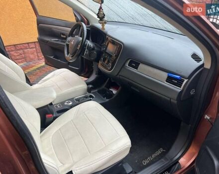 Коричневый Мицубиси Аутлендер, объемом двигателя 2.3 л и пробегом 317 тыс. км за 13000 $, фото 9 на Automoto.ua