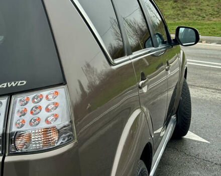 Коричневий Міцубісі Аутлендер, об'ємом двигуна 2.2 л та пробігом 197 тис. км за 11750 $, фото 12 на Automoto.ua