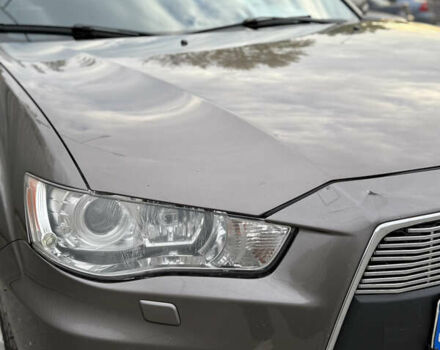 Коричневый Мицубиси Аутлендер, объемом двигателя 2.36 л и пробегом 191 тыс. км за 10900 $, фото 17 на Automoto.ua