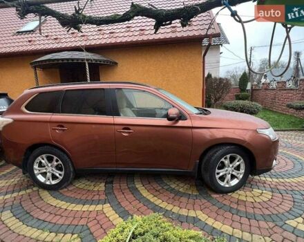 Коричневый Мицубиси Аутлендер, объемом двигателя 2.3 л и пробегом 317 тыс. км за 13000 $, фото 2 на Automoto.ua