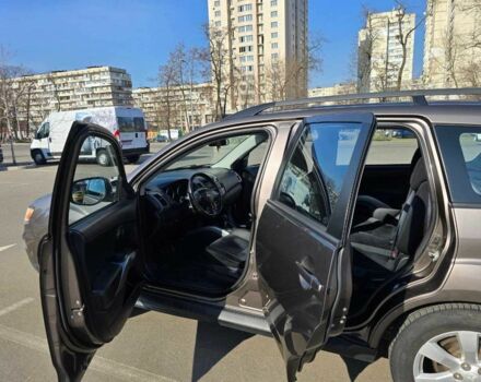 Коричневый Мицубиси Аутлендер, объемом двигателя 2.4 л и пробегом 270 тыс. км за 10300 $, фото 1 на Automoto.ua