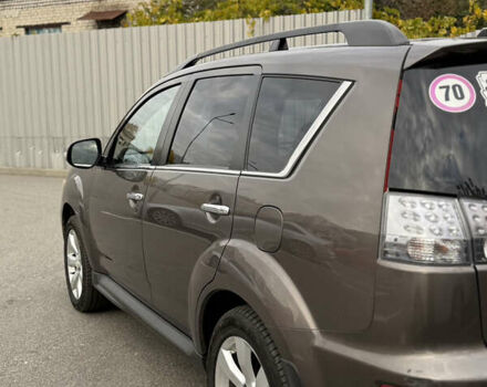 Коричневый Мицубиси Аутлендер, объемом двигателя 2.36 л и пробегом 191 тыс. км за 10900 $, фото 8 на Automoto.ua