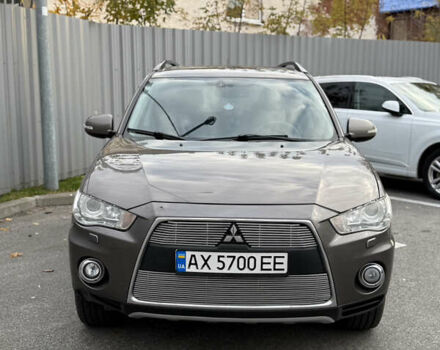 Коричневый Мицубиси Аутлендер, объемом двигателя 2.36 л и пробегом 191 тыс. км за 10900 $, фото 1 на Automoto.ua