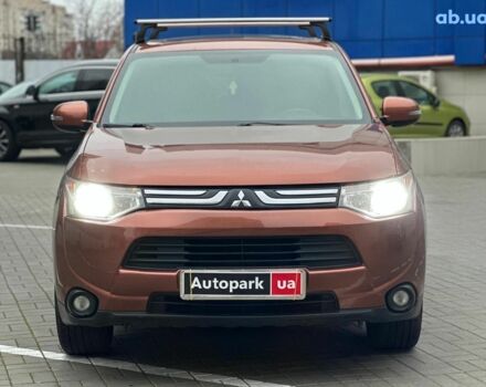 Коричневый Мицубиси Аутлендер, объемом двигателя 2.4 л и пробегом 267 тыс. км за 11990 $, фото 1 на Automoto.ua