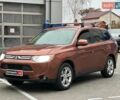 Коричневий Міцубісі Аутлендер, об'ємом двигуна 2.4 л та пробігом 267 тис. км за 11990 $, фото 1 на Automoto.ua
