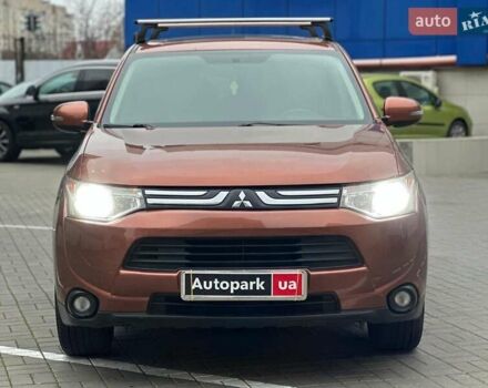 Коричневий Міцубісі Аутлендер, об'ємом двигуна 2.4 л та пробігом 267 тис. км за 11990 $, фото 1 на Automoto.ua