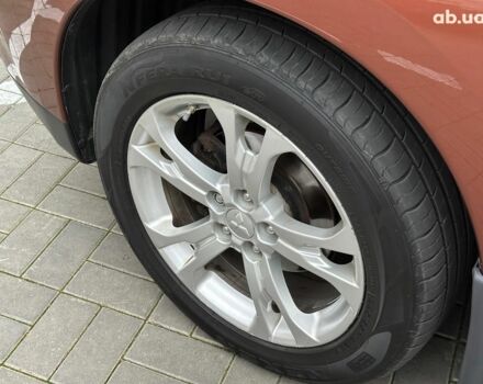 Коричневый Мицубиси Аутлендер, объемом двигателя 2.4 л и пробегом 267 тыс. км за 11990 $, фото 6 на Automoto.ua