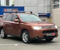 Коричневый Мицубиси Аутлендер, объемом двигателя 2.4 л и пробегом 267 тыс. км за 11990 $, фото 2 на Automoto.ua
