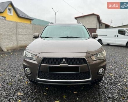 Коричневий Міцубісі Аутлендер, об'ємом двигуна 2.4 л та пробігом 270 тис. км за 9000 $, фото 1 на Automoto.ua