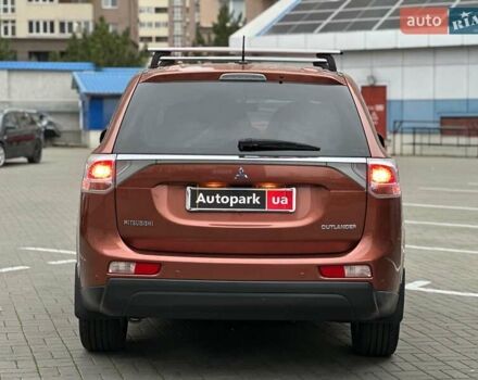 Коричневий Міцубісі Аутлендер, об'ємом двигуна 2.4 л та пробігом 267 тис. км за 11990 $, фото 4 на Automoto.ua