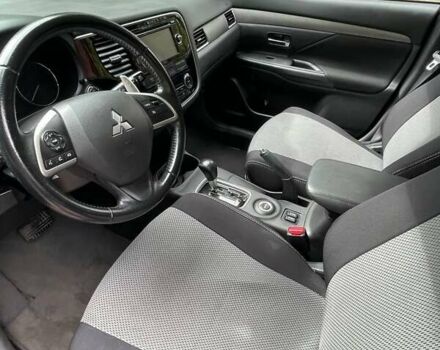 Коричневый Мицубиси Аутлендер, объемом двигателя 2.4 л и пробегом 126 тыс. км за 11500 $, фото 3 на Automoto.ua