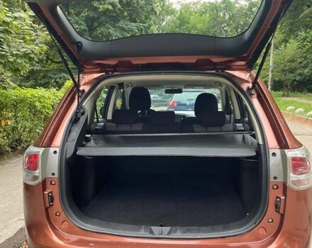 Коричневый Мицубиси Аутлендер, объемом двигателя 2.4 л и пробегом 126 тыс. км за 11500 $, фото 4 на Automoto.ua