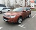 Коричневый Мицубиси Аутлендер, объемом двигателя 2.4 л и пробегом 154 тыс. км за 13700 $, фото 1 на Automoto.ua