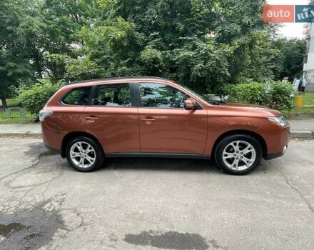Коричневый Мицубиси Аутлендер, объемом двигателя 2.4 л и пробегом 126 тыс. км за 11500 $, фото 2 на Automoto.ua
