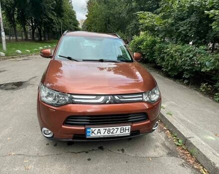 Коричневый Мицубиси Аутлендер, объемом двигателя 2.4 л и пробегом 126 тыс. км за 11500 $, фото 1 на Automoto.ua