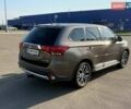 Коричневий Міцубісі Аутлендер, об'ємом двигуна 2.36 л та пробігом 128 тис. км за 15500 $, фото 4 на Automoto.ua
