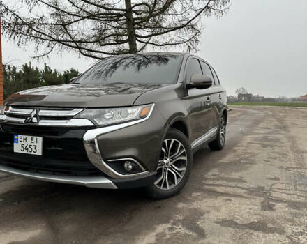 Коричневий Міцубісі Аутлендер, об'ємом двигуна 2.36 л та пробігом 197 тис. км за 14000 $, фото 2 на Automoto.ua