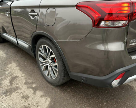 Коричневий Міцубісі Аутлендер, об'ємом двигуна 2.36 л та пробігом 197 тис. км за 14000 $, фото 8 на Automoto.ua