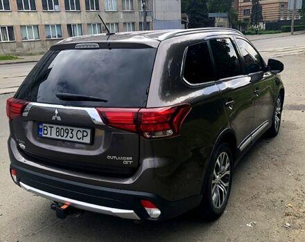 Коричневый Мицубиси Аутлендер, объемом двигателя 3 л и пробегом 160 тыс. км за 17500 $, фото 2 на Automoto.ua