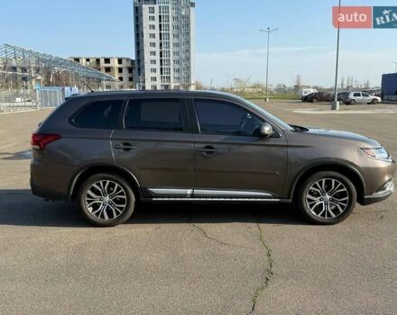 Коричневий Міцубісі Аутлендер, об'ємом двигуна 2.36 л та пробігом 128 тис. км за 15500 $, фото 7 на Automoto.ua