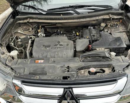 Коричневий Міцубісі Аутлендер, об'ємом двигуна 2.36 л та пробігом 197 тис. км за 14000 $, фото 9 на Automoto.ua