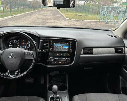 Коричневий Міцубісі Аутлендер, об'ємом двигуна 2.36 л та пробігом 197 тис. км за 14000 $, фото 17 на Automoto.ua