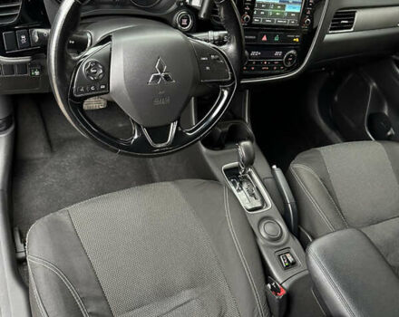 Коричневий Міцубісі Аутлендер, об'ємом двигуна 2.36 л та пробігом 197 тис. км за 14000 $, фото 18 на Automoto.ua