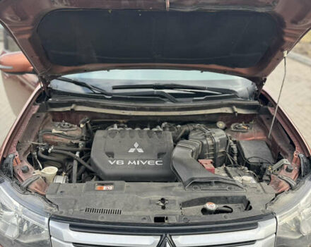 Коричневий Міцубісі Аутлендер, об'ємом двигуна 3 л та пробігом 287 тис. км за 12999 $, фото 16 на Automoto.ua