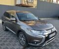 Коричневий Міцубісі Аутлендер, об'ємом двигуна 2.4 л та пробігом 129 тис. км за 12999 $, фото 7 на Automoto.ua