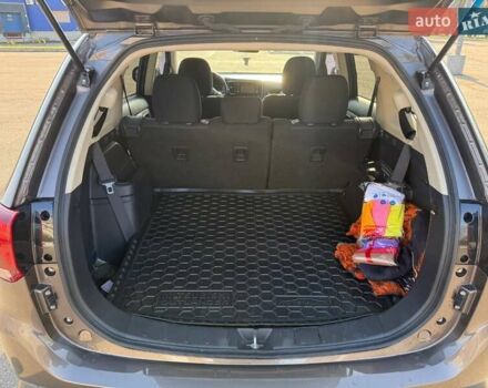 Коричневий Міцубісі Аутлендер, об'ємом двигуна 2.36 л та пробігом 128 тис. км за 15500 $, фото 11 на Automoto.ua