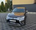 Коричневий Міцубісі Аутлендер, об'ємом двигуна 2.4 л та пробігом 129 тис. км за 12999 $, фото 4 на Automoto.ua