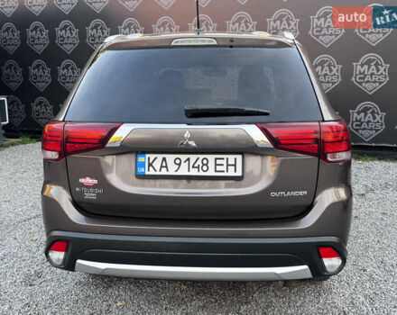 Коричневий Міцубісі Аутлендер, об'ємом двигуна 3 л та пробігом 170 тис. км за 14800 $, фото 4 на Automoto.ua